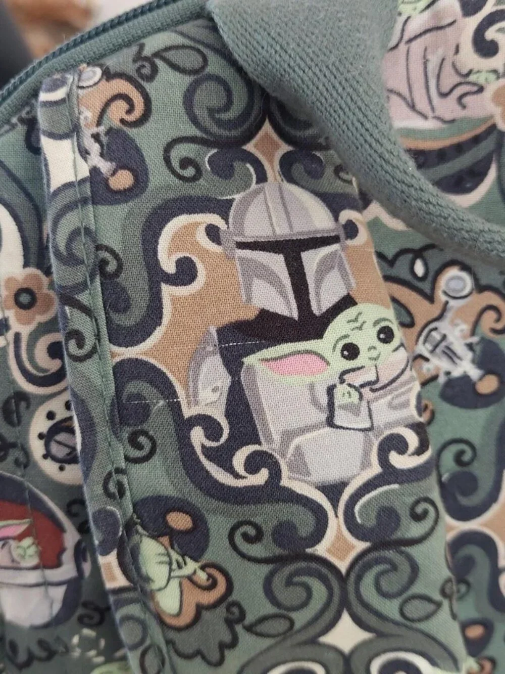 Vera Bradley Star Wars Grogu medallion backpack with repeating cartoon character